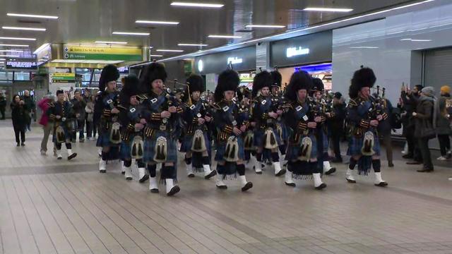 The Port Authority Police Pipes and Drums Band performs inside the main lobby of the south corridor of Port Authority's Midtown Bus Terminal on March 16, 2023. 