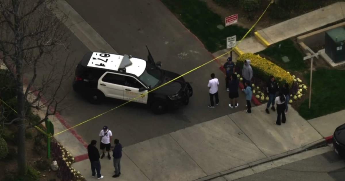 Man and teenager shot dead at swimming pool in Newhall apartment complex