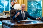 President Biden speaks before signing an executive order to improve government services in the Oval Office of the White House, Monday, Dec. 13, 2021. 