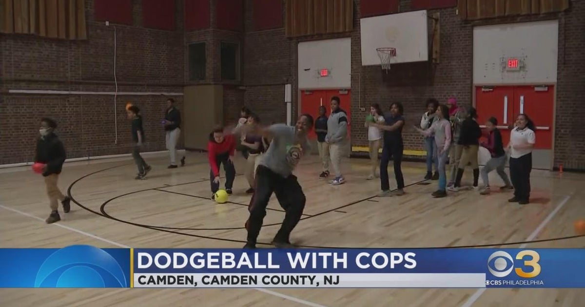 Camden County police officers play dodgeball with Yorkship Elementary