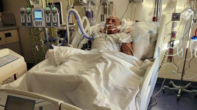 Wilson Patricio Chaba in a hospital bed 