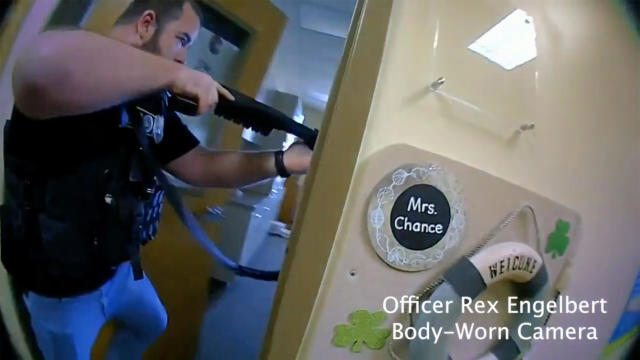 This image from bodycam footage provided by the Metropolitan Nashville Police Department shows police responding to a shooting at The Covenant School in Nashville, Tenn., on March 27, 2023. 