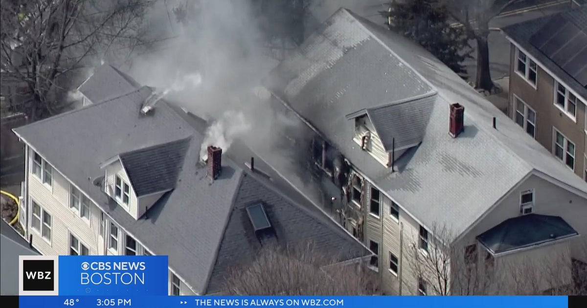 Fire in Lynn tears through two homes - CBS Boston