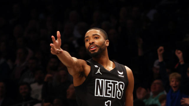 Mikal Bridges #1 of the Brooklyn Nets reacts after making a three-pointer during the game against the Atlanta Hawks at Barclays Center on March 31, 2023 in New York City. 