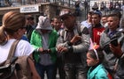 mayorkas-8-sharyn-talking-to-men-in-juarez-cathedral-plaza.jpg 