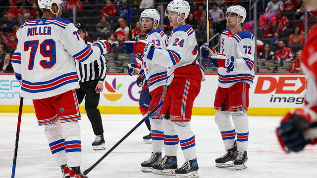 Kaapo Kakko #24 of the New York Rangers celebrates a second period goal with K'Andre Miller #79, Filip Chytil #72 and Alexis LafreniÃ¨re #13 against the Washington Capitals at Capital One Arena on April 2, 2023 in Washington, D.C. 