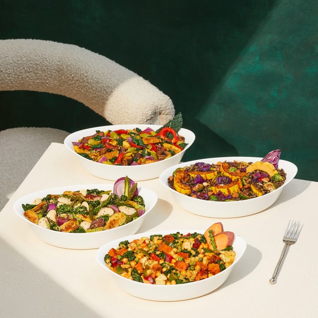 Four plated dishes from Daily Harvest's Harvest Bakes collection