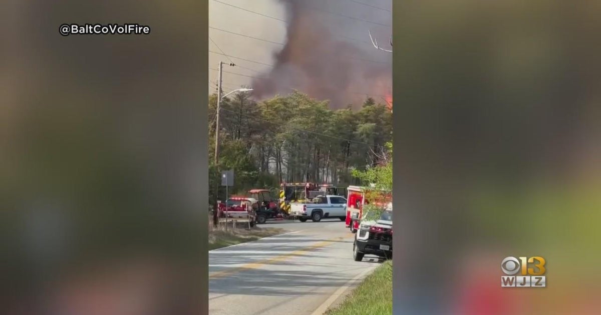 More than two dozen homes told to evacuate because of large brush fire ...