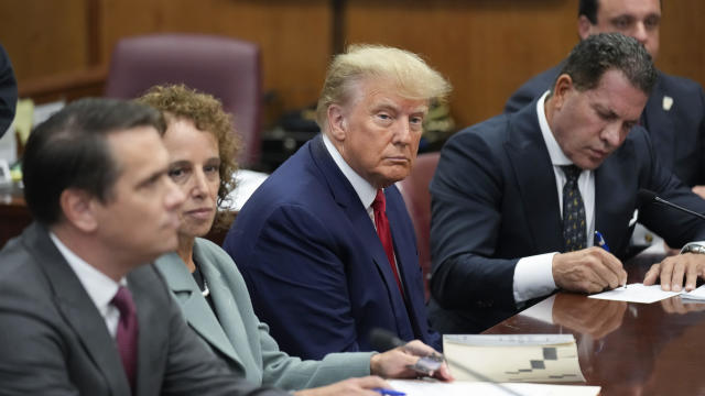 Former President Donald Trump sits at the defense table with his defense team in a Manhattan courtroom on Tuesday, April 4, 2023, in New York. 