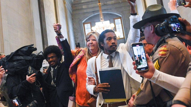 Tennessee Reps. Pearson, Johnson and Jones walk through crowd of supporters at Tennessee State Capitol in Nashville 