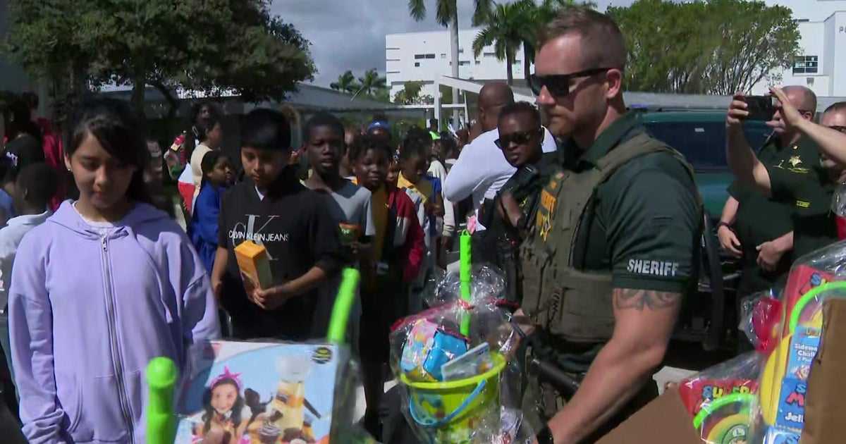 Arresting hunger in Pompano Seaside, BSO distributes Easter baskets, bins of food stuff