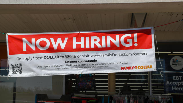 A now hiring sign is seen at the Family Dollar store at the 