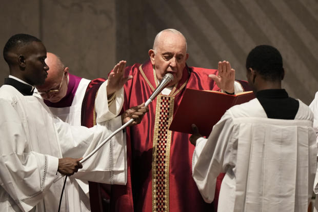 Pope Francis celebrates the Passion Mass on Good Friday, inside St. Peter's Basilica, at the Vatican, April 7, 2023. 