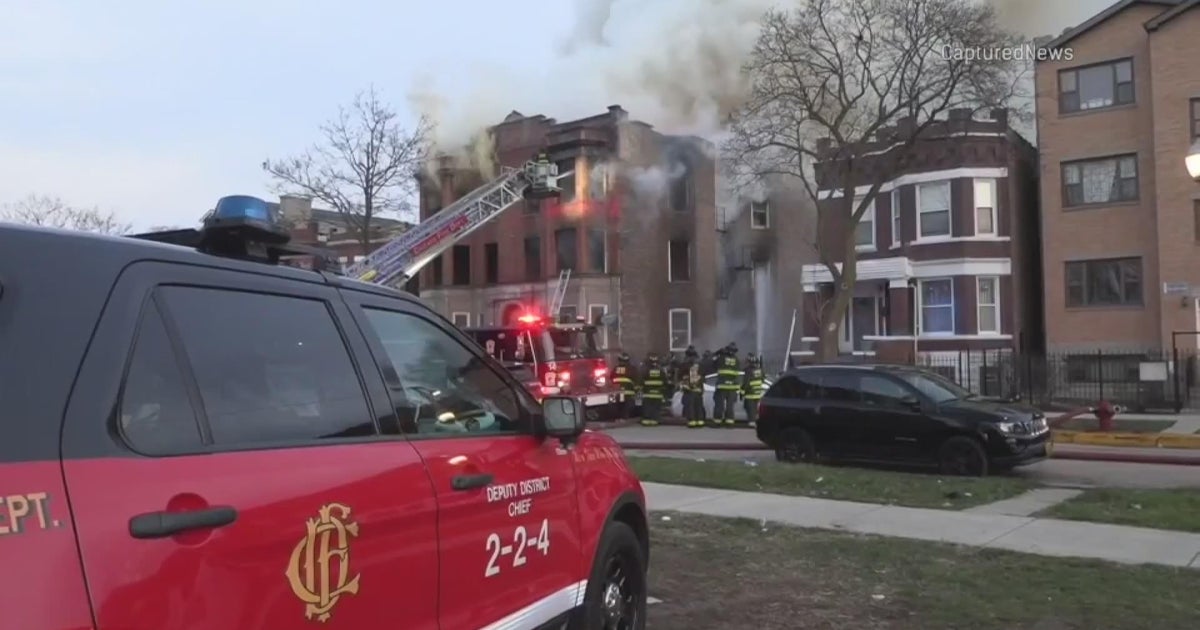 Woman hospitalized after fire in West Garfield Park - CBS Chicago