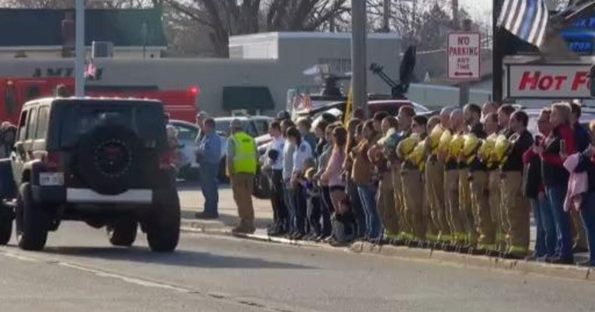 Communities line streets for procession honoring 2 fallen Wisconsin officers