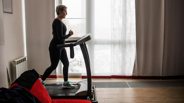 senior woman on treadmill 