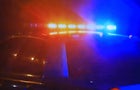Police car - fast moving with bright flashing lights 