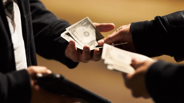 Midsection Of Business Colleagues Shaking Hands 