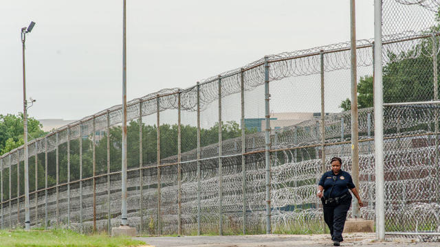 Stephen Moyer, Secretary of the Maryland Dept of Public Safety and Correctional Services, tours the Correctional Institution for Women with the warden, Margaret Chippendale. 