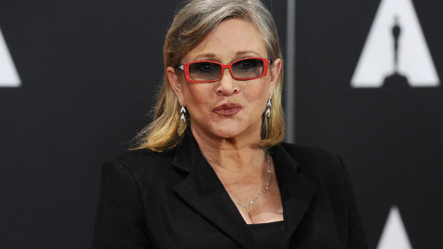 Carrie Fisher attending an awards event in 2015 
