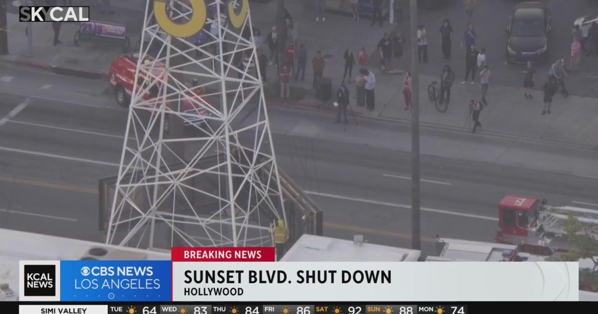 Sunset Blvd shut down as man climbs up KTLA tower