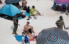 Mexican Marines patrol at Gaviota Azul beach during Holy Week in Cancun 