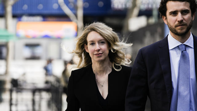 Elizabeth Holmes and Billy Evans on the street 