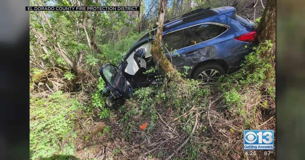 Photos show rescue operation after car goes down embankment