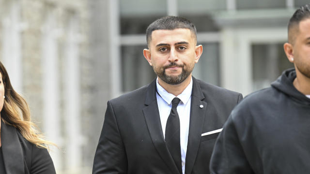 Nauman Hussain, who ran the limousine company involved in the 2018 crash that killed 20 people, walks outside during a lunch break in a new trial in Schoharie, N.Y., on Monday, May 1, 2023. 