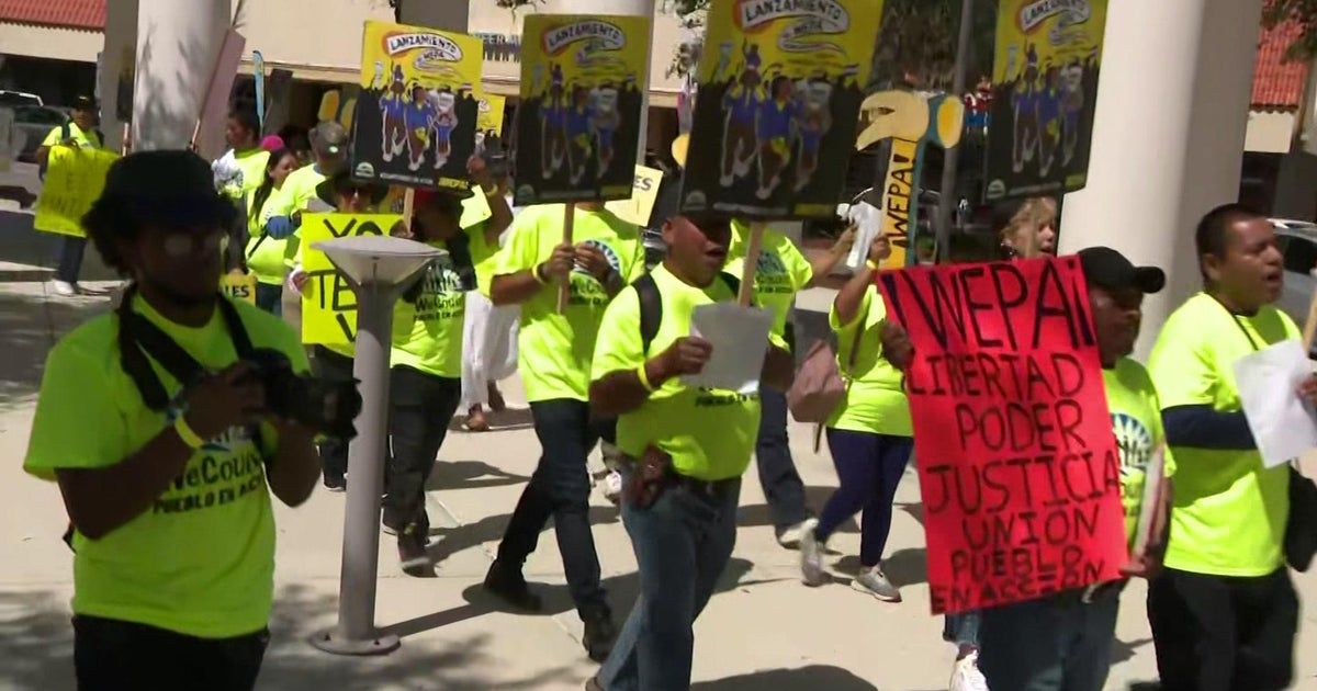 Dozens rally for immigrant employee illustration in Homestead