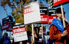 Writers' strike: Hollywood scribes picket studios for better pay. 'It's not sustainable' 