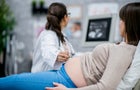 Pregnant woman gets an ultrasound exam 