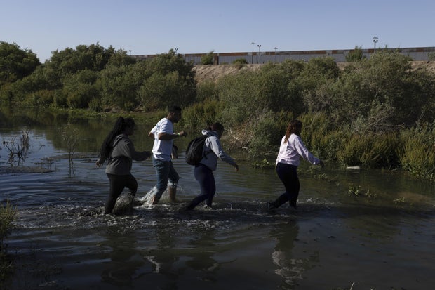 Hundreds of Venezuelan migrants try to cross the border by foot from Mexico to United States on April 25, 2023.