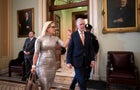 Sens. Kyrsten Sinema and Sen. Thom Tillis leave the Senate chamber on Tuesday, Feb. 25, 2020. 