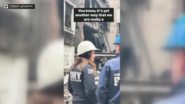 FDNY Commissioner Laura Kavanagh wears a hard hat while standing at the site of a parking garage collapse in Lower Manhattan. 