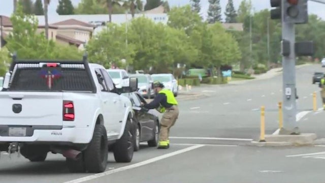 Roseville firefighters collect donations from drivers for their Fill the Boot Drives 