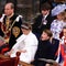 Prince Louis spotted waving and yawning during the coronation before retiring