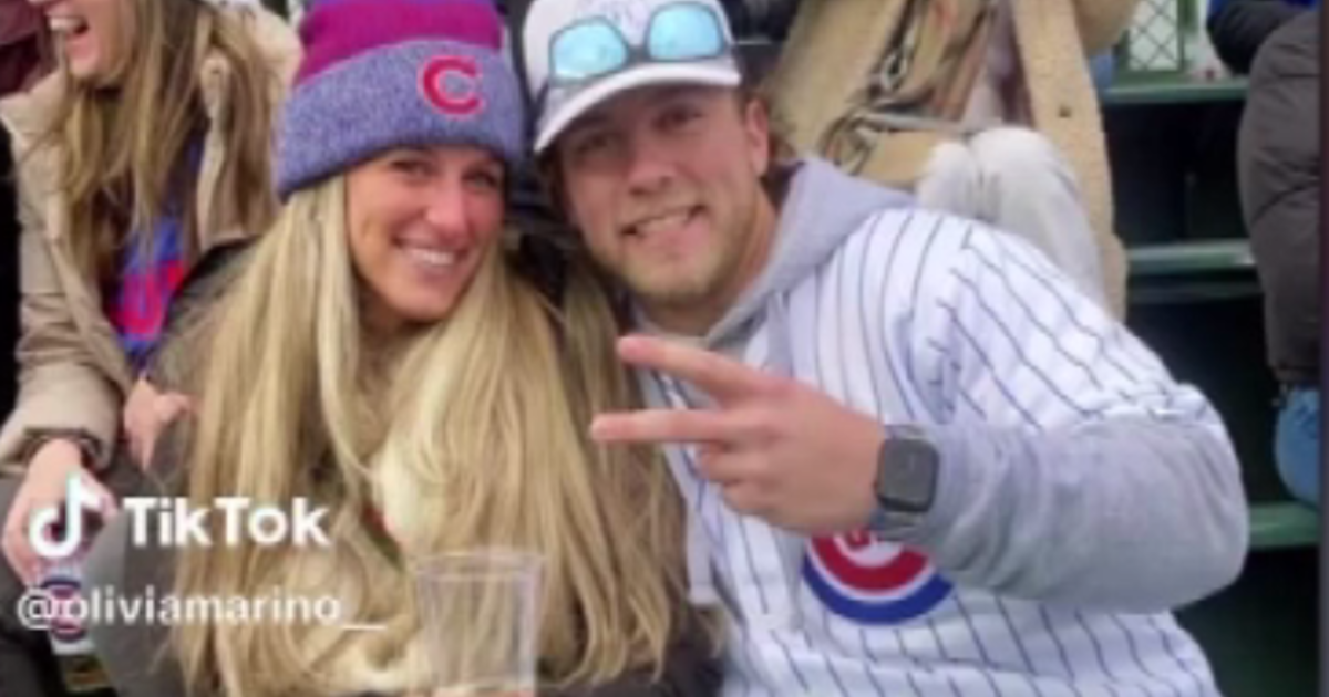 Romance in the bleachers: Cute moment caught on video at Cubs game - CBS  Chicago