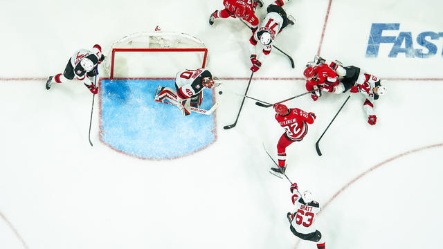 Jesperi Kotkaniemi #82 of the Carolina Hurricanes scores a goal against Akira Schmid #40 of the New Jersey Devils during the second period in Game Two of the Second Round of the 2023 Stanley Cup Playoffs at PNC Arena on May 05, 2023 in Raleigh, North Caro 