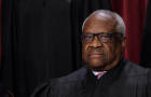 Supreme Court Justice Clarence Thomas poses for the official photo at the Supreme Court in Washington on Oct. 7, 2022. 