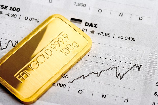 should-you-invest-in-gold-stocks-or-both.jpg 