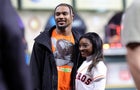 Simone Biles and Jonathan Owens at a World Series game 