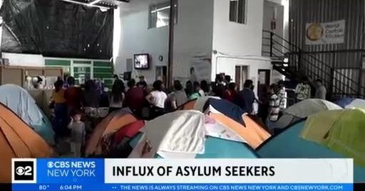 Communities across US try to find ways to asylum seekers