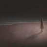 Woman alone with night sea 