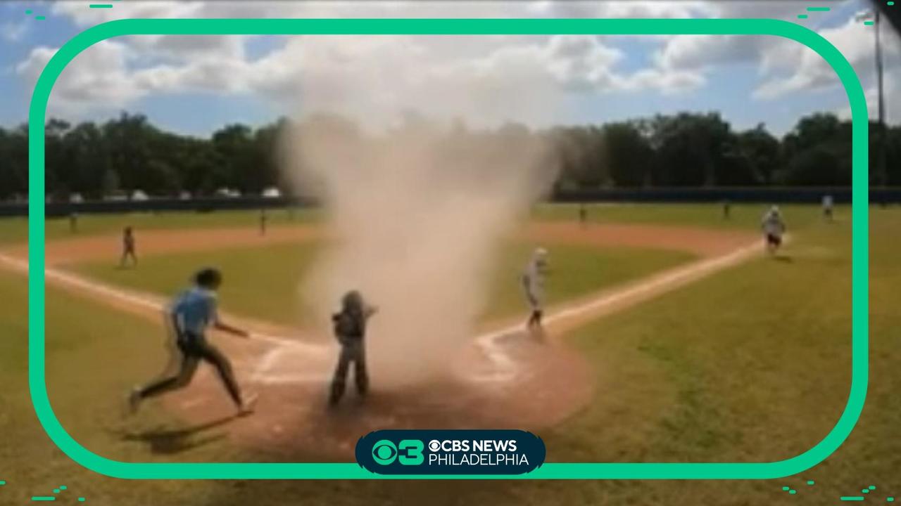 Florida dust devil engulfs 7-year-old baseball catcher VIDEO