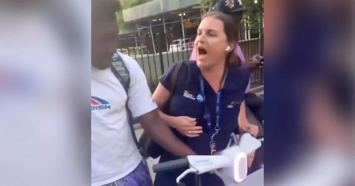 New York City hospital worker accused of trying to take bike from Black teens in viral video. Bellevue hospital now investigating.