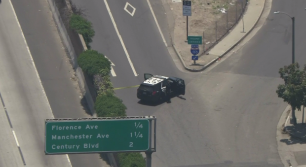 Officer shot at in South LA: Portion of 110 Fwy shut down - CBS News