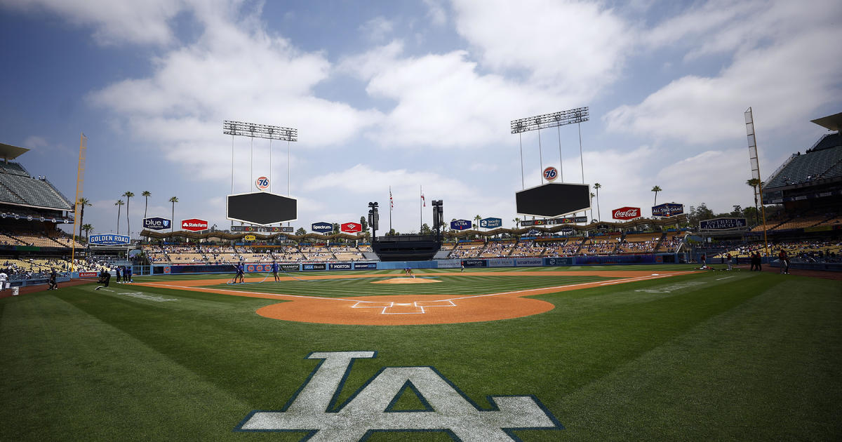 Thousands gather outside Dodger's Stadium to protest team's
