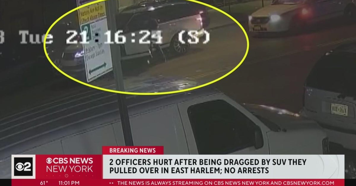 2 NYPD officers hurt after being dragged by SUV in East Harlem - CBS ...