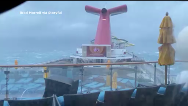 Water surges into rooms on Carnival cruise ship battered by waves off Charleston